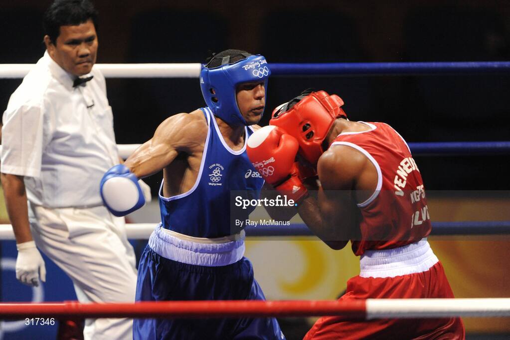 20 August 2008; Darren Sutherland, Ireland, in action against Alfonso Blanco Parra, in red from Venezuela, during their quarter-final bout of the Middle weight, 75kg, contest. Beijing 2008 - Games of the XXIX Olympiad, Beijing Workers Gymnasium, Olympic Green, Beijing, China. Picture credit: Ray McManus / SPORTSFILE