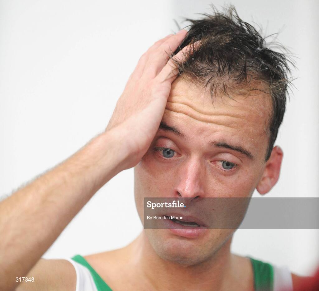 20 August 2008; Alistair Cragg, Ireland, after his heat of the Men's 5000m, where he finished 6th in a time of 13:38.57 and qualified for the final. Beijing 2008 - Games of the XXIX Olympiad, National Stadium, Olympic Green, Beijing, China. Picture credit: Brendan Moran / SPORTSFILE