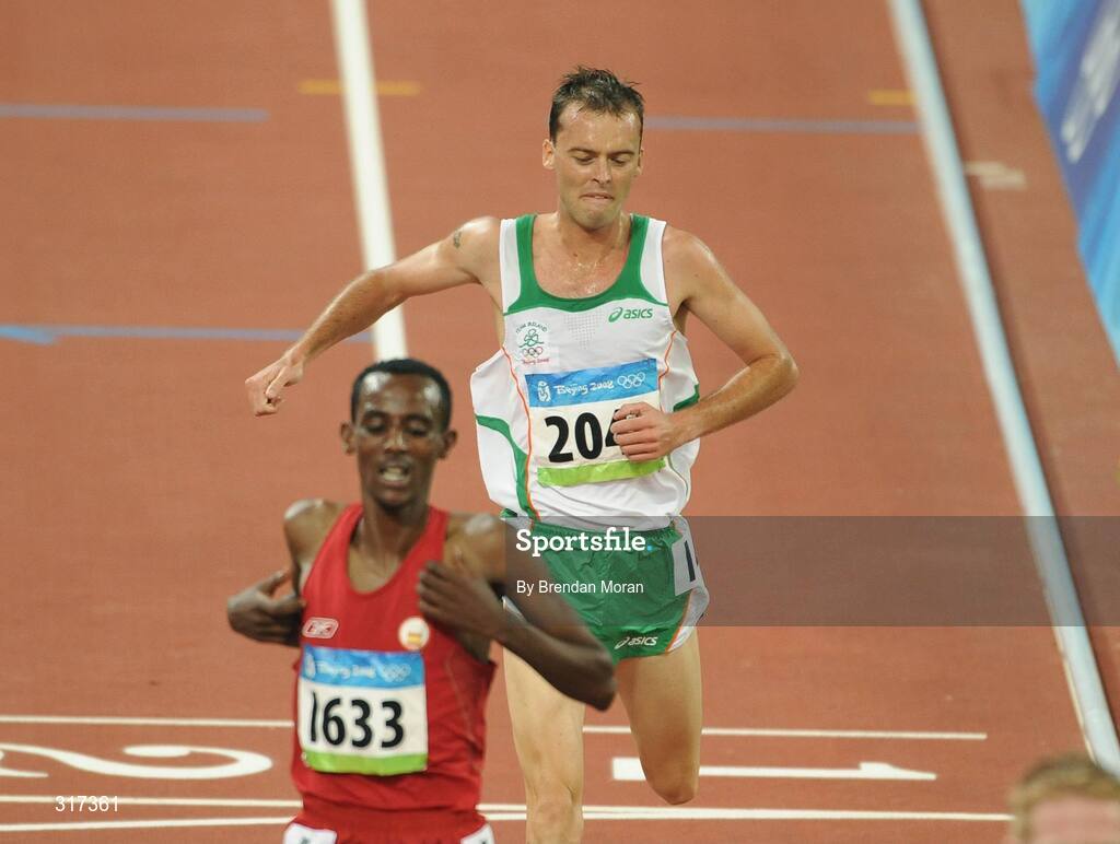 20 August 2008; Alistair Cragg, 2041, Ireland, reacts as he crosses the finish line during his heat of the Men's 5000m, where he finished 6th in a time of 13:38.57 and qualified for the final. Beijing 2008 - Games of the XXIX Olympiad, National Stadium, Olympic Green, Beijing, China. Picture credit: Brendan Moran / SPORTSFILE
