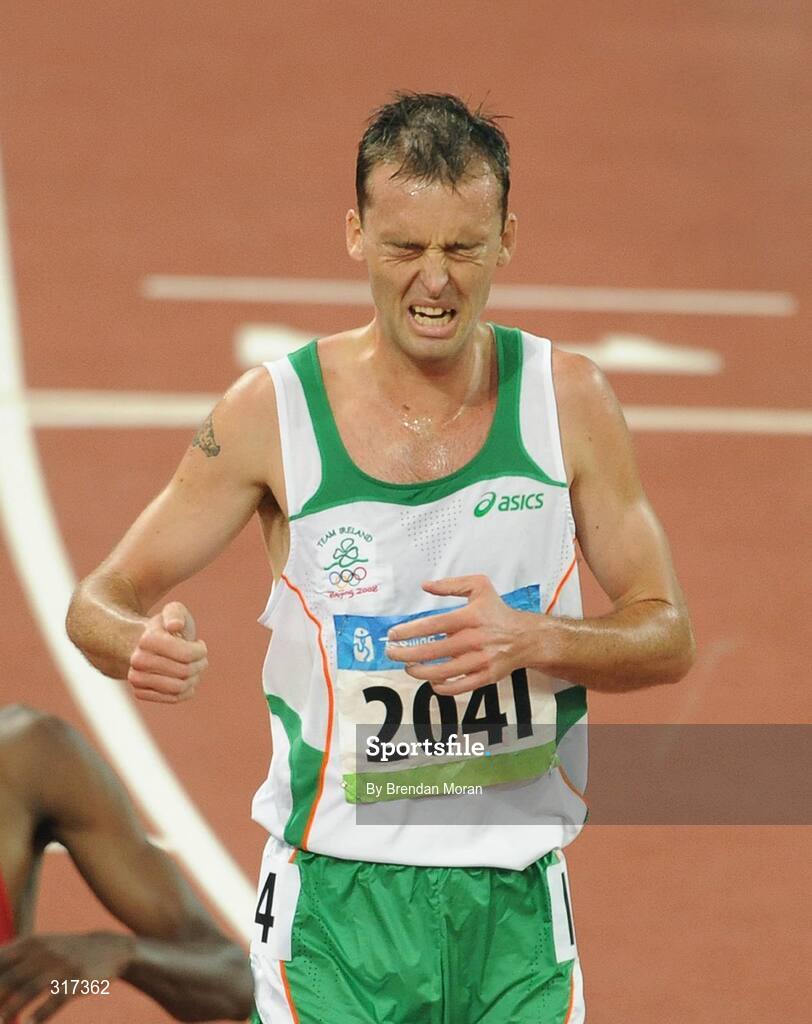 20 August 2008; Alistair Cragg, 2041, Ireland, reacts as he crosses the finish line during his heat of the Men's 5000m, where he finished 6th in a time of 13:38.57 and qualified for the final. Beijing 2008 - Games of the XXIX Olympiad, National Stadium, Olympic Green, Beijing, China. Picture credit: Brendan Moran / SPORTSFILE