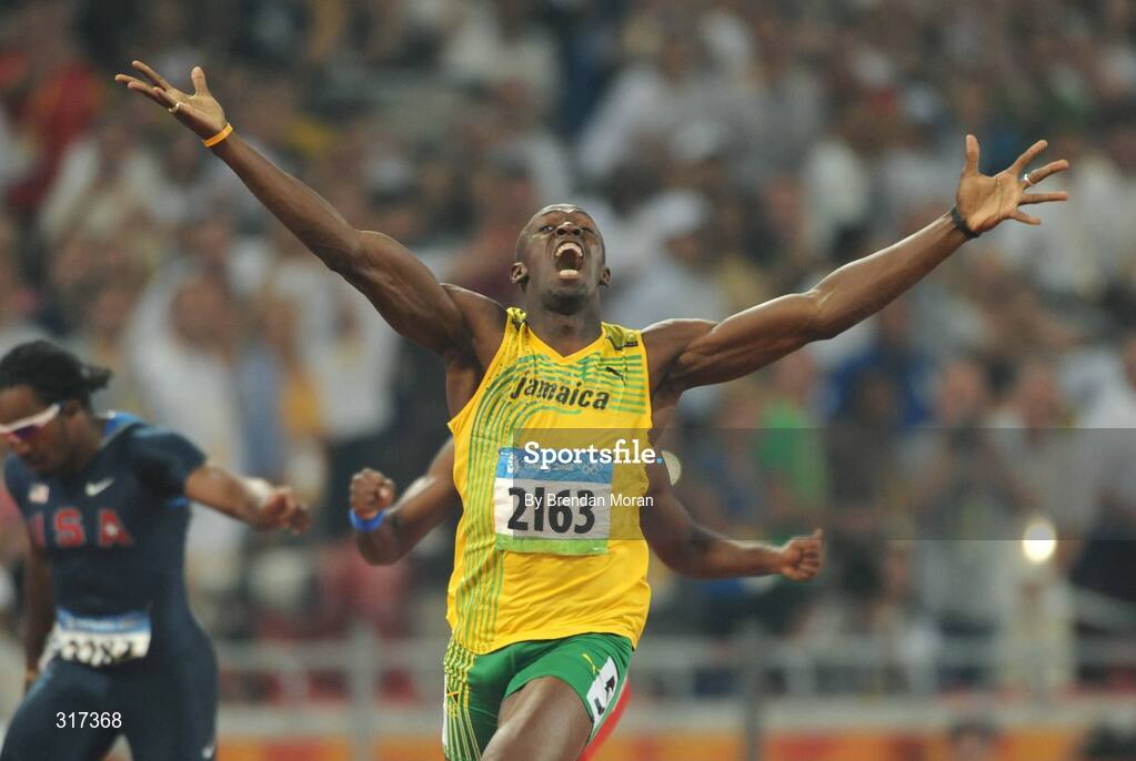 20 August 2008; Usain Bolt, of Jamaica, celebrates winning the Men's 200m Final in a new world record time of 19.30 seconds. Beijing 2008 - Games of the XXIX Olympiad, National Stadium, Olympic Green, Beijing, China. Picture credit: Brendan Moran / SPORTSFILE