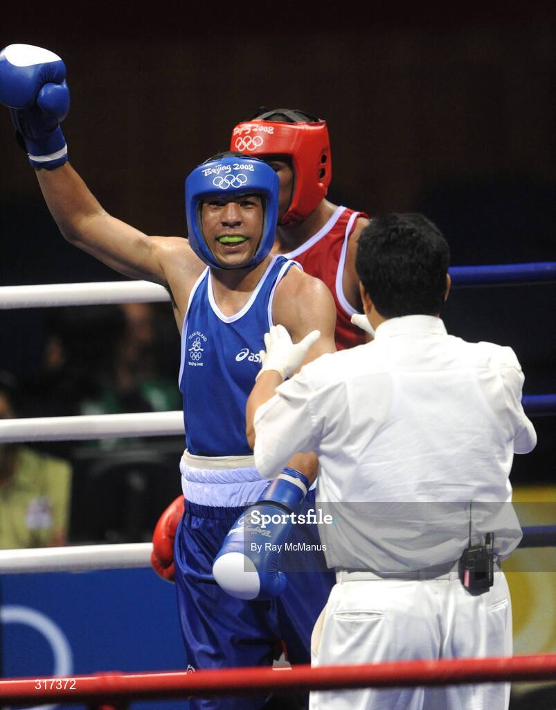 20 August 2008; Darren Sutherland, Ireland, celebrates, on the final bell, victory over Alfonso Blanco Parra, from Venezuela, during a quarter-final bout of the Middle weight, 75kg, contest. Beijing 2008 - Games of the XXIX Olympiad, Beijing Workers Gymnasium, Olympic Green, Beijing, China. Picture credit: Ray McManus / SPORTSFILE