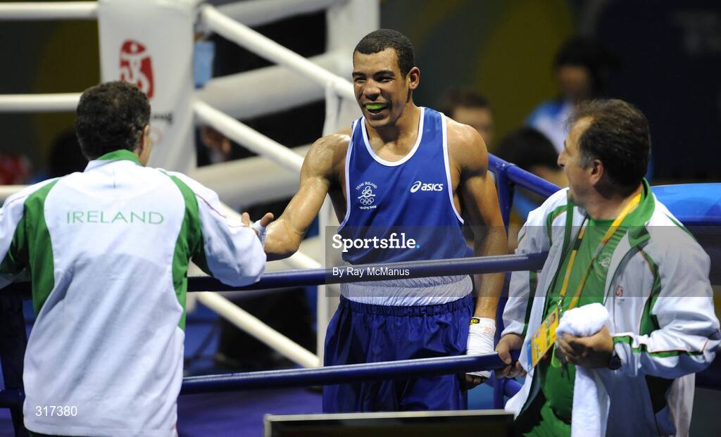 20 August 2008; Darren Sutherland, Ireland, is congratulated by head coach Billy Walsh and technical coach Zaur Antia between rounds after his victory over Alfonso Blanco Parra, from Venezuela, during their quarter-final bout of the Middle weight, 75kg, contest. Beijing 2008 - Games of the XXIX Olympiad, Beijing Workers Gymnasium, Olympic Green, Beijing, China. Picture credit: Ray McManus / SPORTSFILE