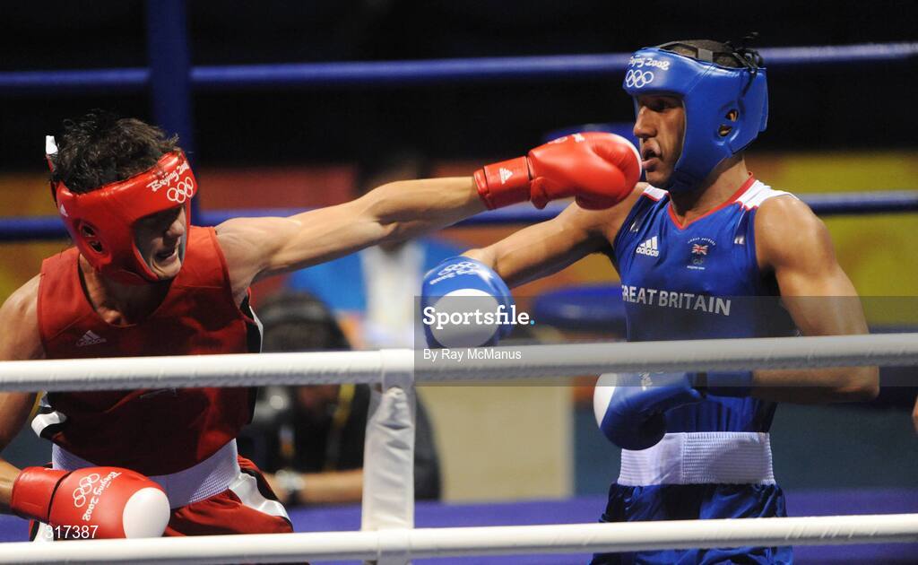 20 August 2008; James Degale, Great Britain, in action against Bakhtiyar Artayev, in red from Kazakastan, during their quarter-final bout of the Middle weight, 75kg, contest. Beijing 2008 - Games of the XXIX Olympiad, Beijing Workers Gymnasium, Olympic Green, Beijing, China. Picture credit: Ray McManus / SPORTSFILE