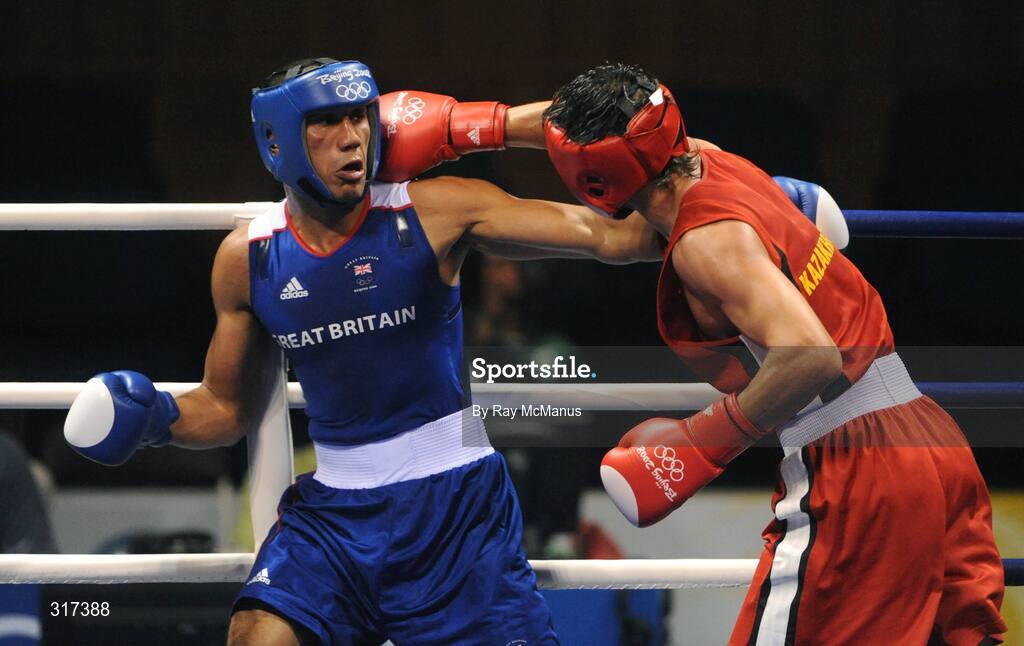 20 August 2008; James Degale, Great Britain, in action against Bakhtiyar Artayev, in red from Kazakastan, during their quarter-final bout of the Middle weight, 75kg, contest. Beijing 2008 - Games of the XXIX Olympiad, Beijing Workers Gymnasium, Olympic Green, Beijing, China. Picture credit: Ray McManus / SPORTSFILE