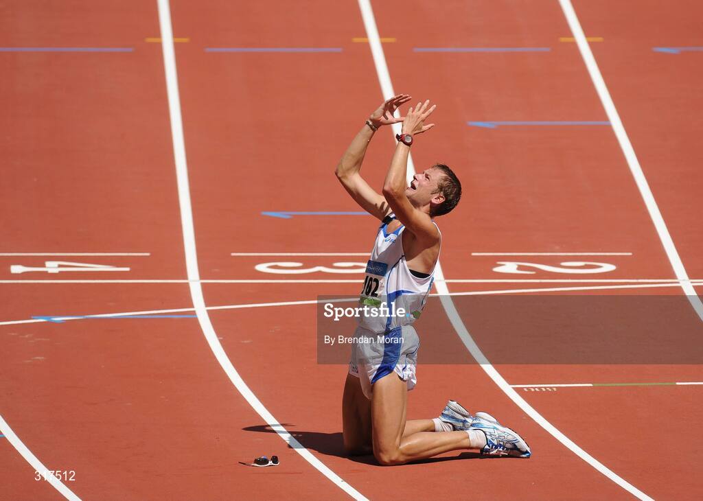 22 August 2008; Alex Schwazer, of Italy, celebrates winning the Men's 50km Walk Final. Beijing 2008 - Games of the XXIX Olympiad, National Stadium, Olympic Green, Beijing, China. Picture credit: Brendan Moran / SPORTSFILE