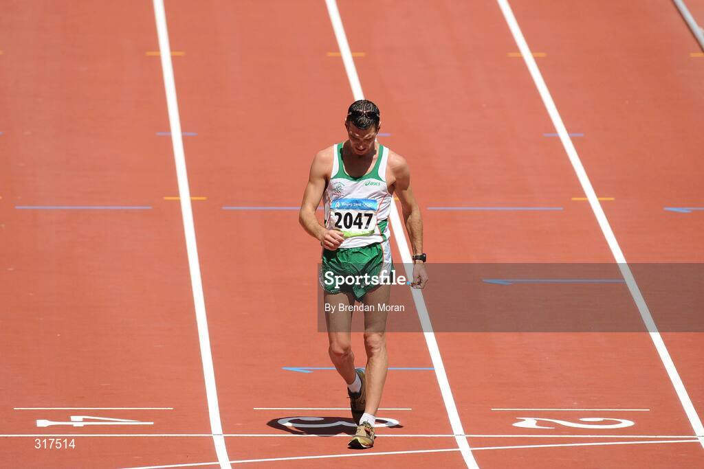 22 August 2008; Jamie Costin, 2047, Ireland, crosses the finish line during the Men's 50km Walk Final, where he finished 44th in a time of 4:15.16. Beijing 2008 - Games of the XXIX Olympiad, National Stadium, Olympic Green, Beijing, China. Picture credit: Brendan Moran / SPORTSFILE