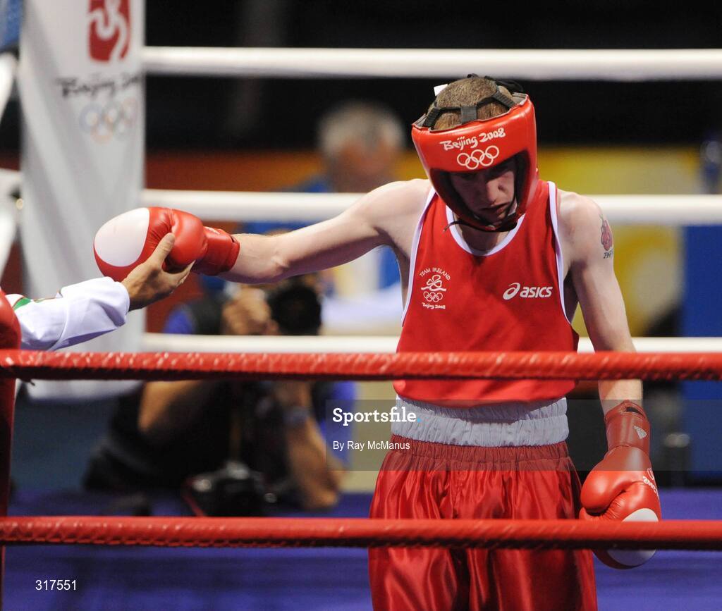 22 August 2008; Coach Billy Walsh extends his hand to commiserate with Ireland's Paddy Barnes after he was beaten by Shiming Zou, from China, in their semi-final bout in the Light Fly weight, 48kg, contest. Beijing 2008 - Games of the XXIX Olympiad, Beijing Workers Gymnasium, Olympic Green, Beijing, China. Picture credit: Ray McManus / SPORTSFILE