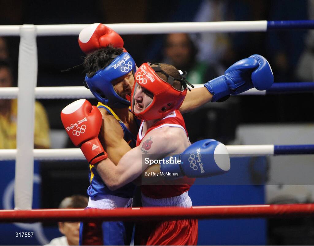 22 August 2008; Paddy Barnes, Ireland, in action against Shiming Zou, in blue from China, during their semi-final bout in the Light Fly weight, 48kg, contest. Beijing 2008 - Games of the XXIX Olympiad, Beijing Workers Gymnasium, Olympic Green, Beijing, China. Picture credit: Ray McManus / SPORTSFILE