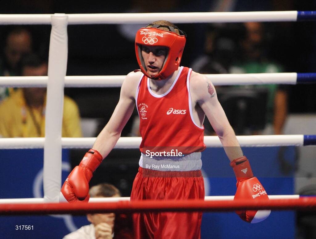 22 August 2008; Paddy Barnes, Ireland, at the end of the contest with Shiming Zou, from China, in their semi-final bout in the Light Fly weight, 48kg, contest. Beijing 2008 - Games of the XXIX Olympiad, Beijing Workers Gymnasium, Olympic Green, Beijing, China. Picture credit: Ray McManus / SPORTSFILE