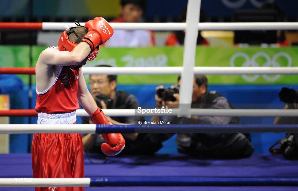 22 August 2008; Paddy Barnes, Ireland, reacts after Zou Sheming, China, defeated him in their semi-final bout in the Light Fly weight, 48kg, contest. Beijing 2008 - Games of the XXIX Olympiad, Beijing Workers' Gymnasium, Olympic Green, Beijing, China. Picture credit: Brendan Moran / SPORTSFILE