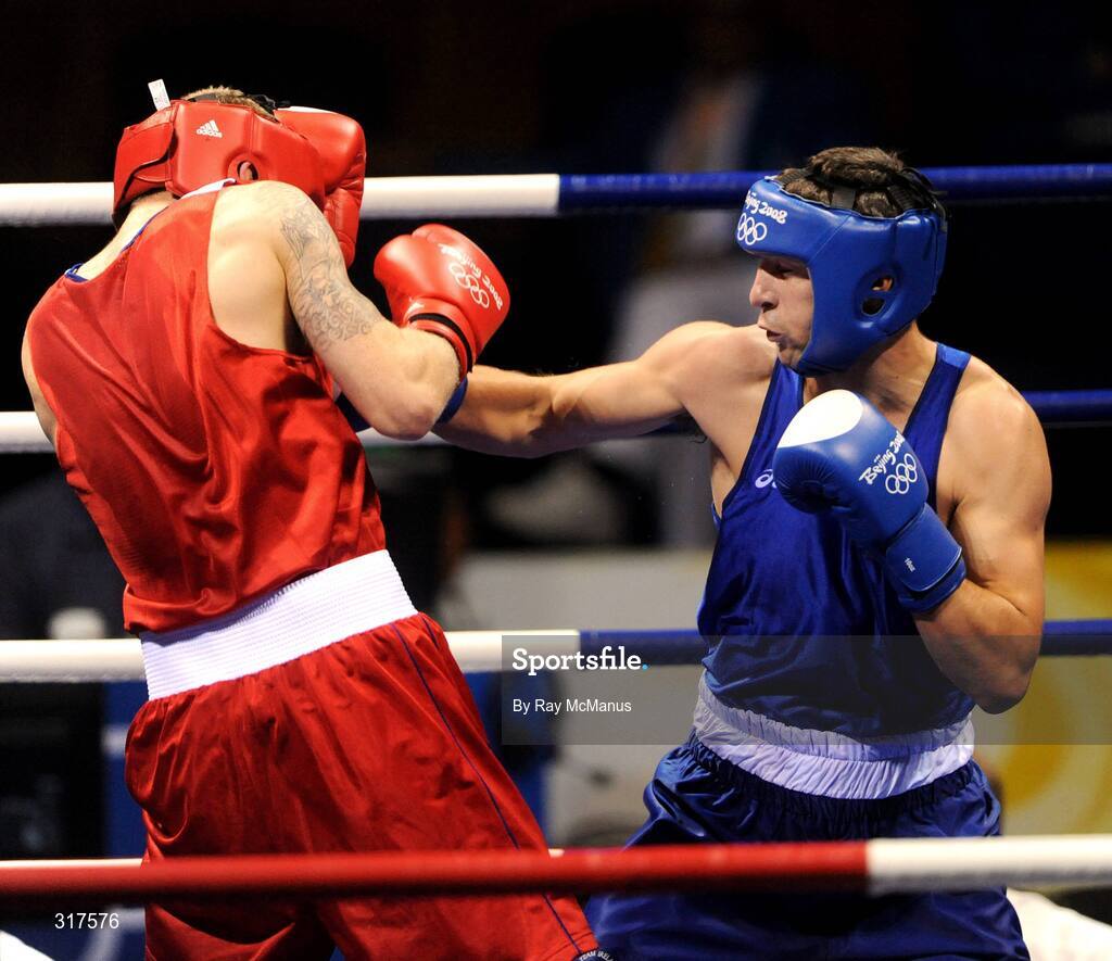 22 August 2008; Kenny Egan, Ireland, scores his first point against Tony Jeffries, in red from Great Brittan, during their semi-final bout of the Light Heavy weight, 81kg, contest. Beijing 2008 - Games of the XXIX Olympiad, Beijing Workers Gymnasium, Olympic Green, Beijing, China. Picture credit: Ray McManus / SPORTSFILE