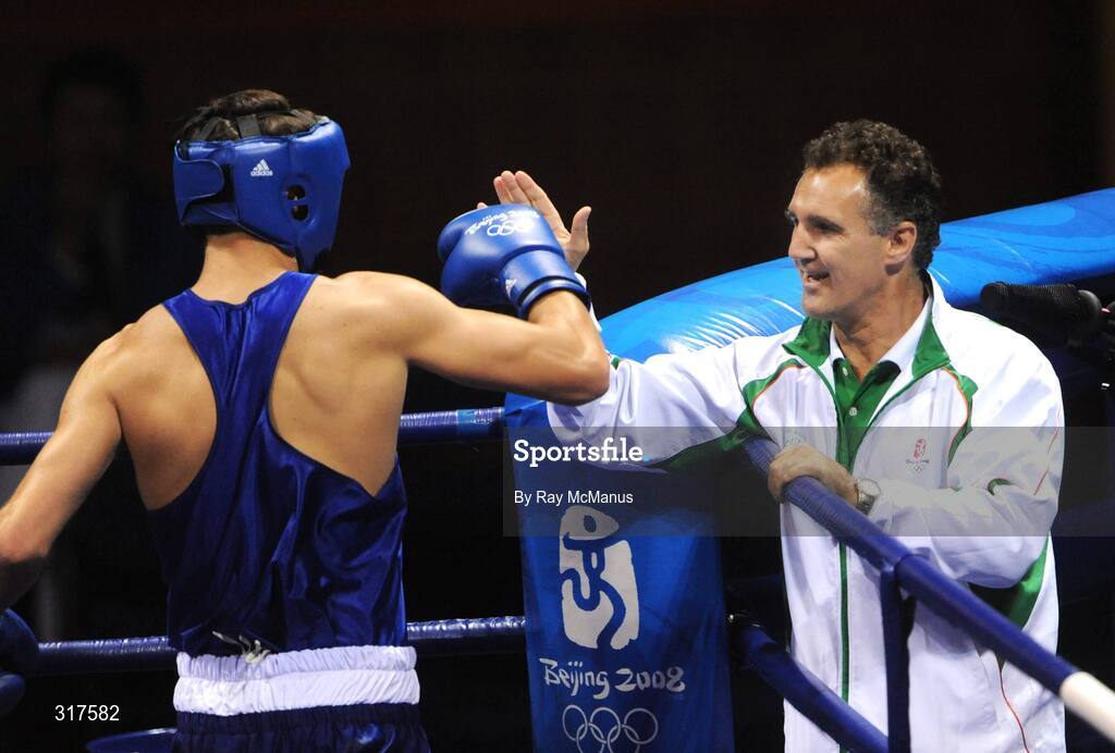 22 August 2008; Kenny Egan, Ireland, with head coach Billy walsh before his fight with Tony Jeffries, from Great Brittan, during their semi-final bout of the Light Heavy weight, 81kg, contest. Beijing 2008 - Games of the XXIX Olympiad, Beijing Workers Gymnasium, Olympic Green, Beijing, China. Picture credit: Ray McManus / SPORTSFILE
