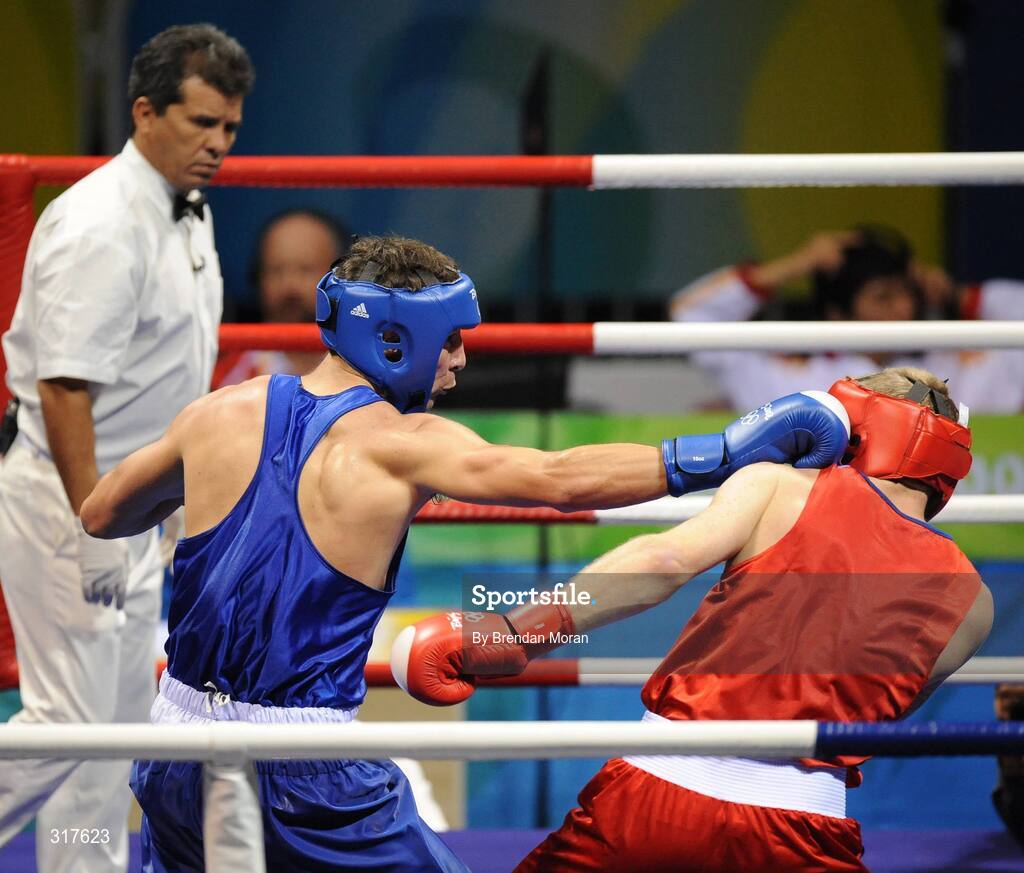 22 August 2008; Kenny Egan, Ireland, in action against Tony Jeffries, in red, Great Britain, during their semi-final bout in the Light Heavy weight, 81kg, contest. Beijing 2008 - Games of the XXIX Olympiad, Beijing Workers' Gymnasium, Olympic Green, Beijing, China. Picture credit: Brendan Moran / SPORTSFILE