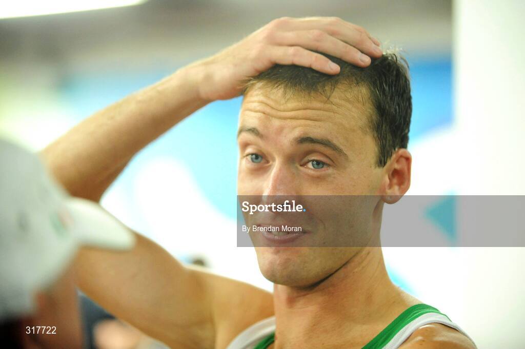 23 August 2008; Alistair Cragg, Ireland, leaves the track after the Men's 5000m Final, which he failed to finish. Beijing 2008 - Games of the XXIX Olympiad, National Stadium, Olympic Green, Beijing, China. Picture credit: Brendan Moran / SPORTSFILE
