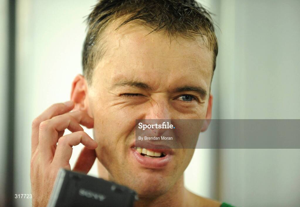 23 August 2008; Alistair Cragg, Ireland, speaking to journalists after the Men's 5000m Final, which he failed to finish. Beijing 2008 - Games of the XXIX Olympiad, National Stadium, Olympic Green, Beijing, China. Picture credit: Brendan Moran / SPORTSFILE