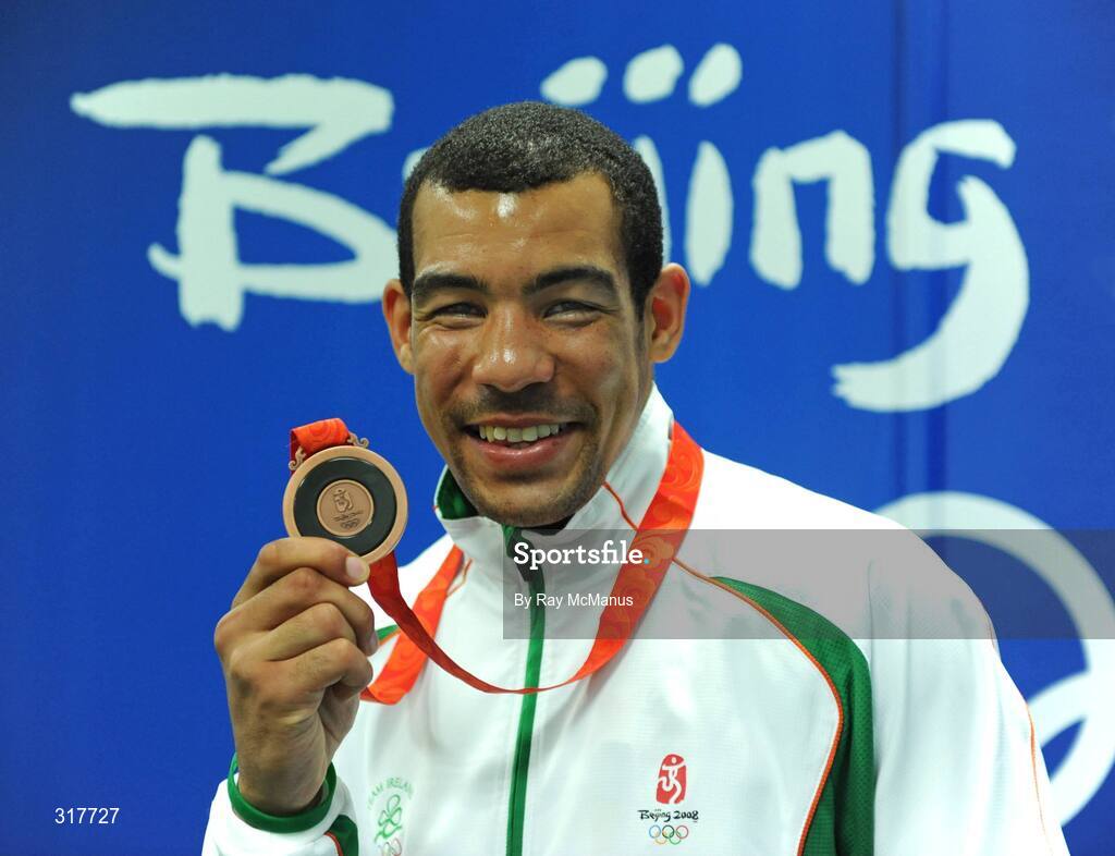 23 August 2008; Ireland's Darren Sutherland with his Olympic Bronze Medal which was presented after the final of the the Middleweight, 75kg, division. Beijing 2008 - Games of the XXIX Olympiad, Beijing Workers' Gymnasium, Olympic Green, Beijing, China. Picture credit: Ray McManus / SPORTSFILE