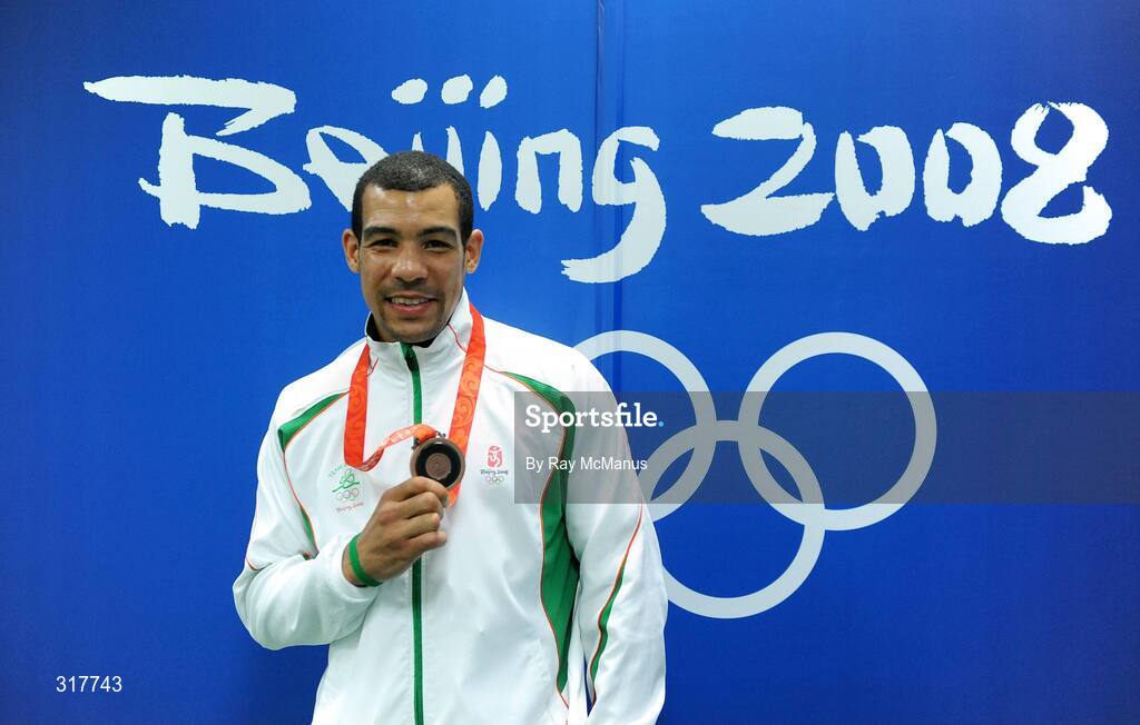 23 August 2008; Ireland's Darren Sutherland strikes a pose with his Olympic Bronze Medal which was presented after the final of the Middleweight, 75kg, division. Beijing 2008 - Games of the XXIX Olympiad, Beijing Workers' Gymnasium, Olympic Green, Beijing, China. Picture credit: Ray McManus / SPORTSFILE