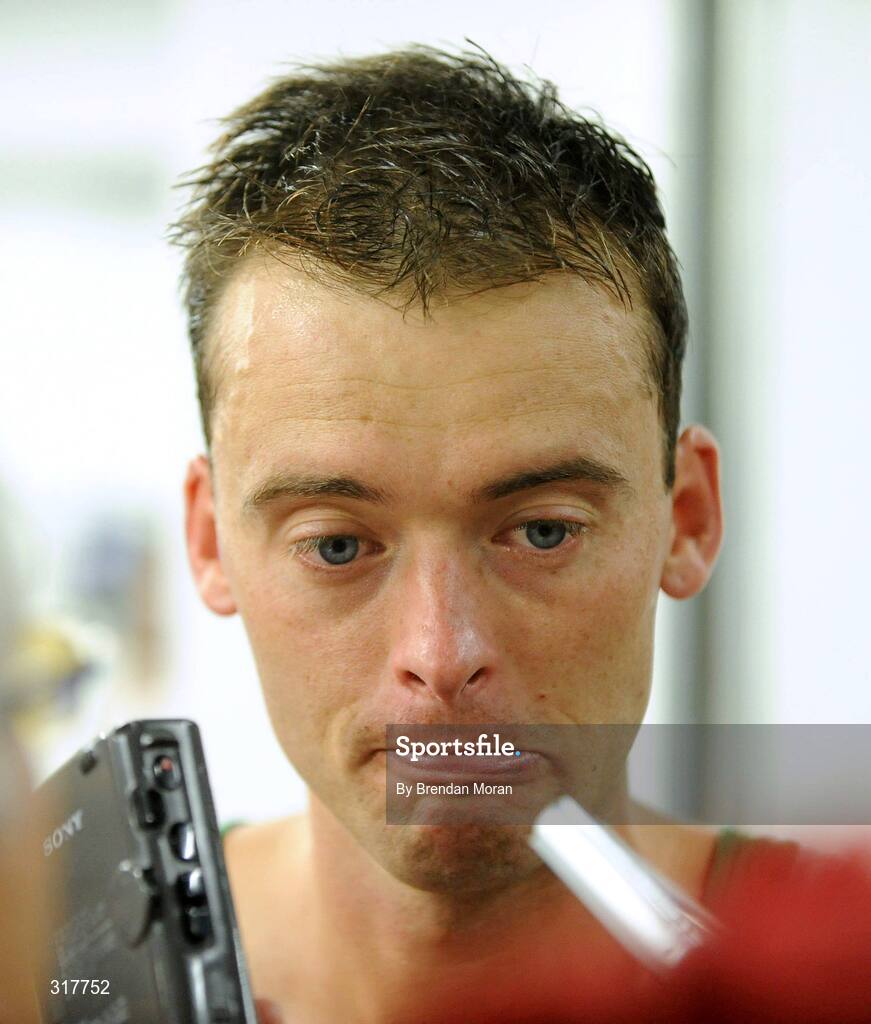 22 August 2008; Alistair Cragg, Ireland, speaking to journalists after the Men's 5000m Final, which he failed to finish. Beijing 2008 - Games of the XXIX Olympiad, National Stadium, Olympic Green, Beijing, China. Picture credit: Brendan Moran / SPORTSFILE
