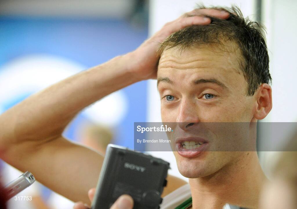 23 August 2008; Alistair Cragg, Ireland, speaking to journalists after the Men's 5000m Final, which he failed to finish. Beijing 2008 - Games of the XXIX Olympiad, National Stadium, Olympic Green, Beijing, China. Picture credit: Brendan Moran / SPORTSFILE