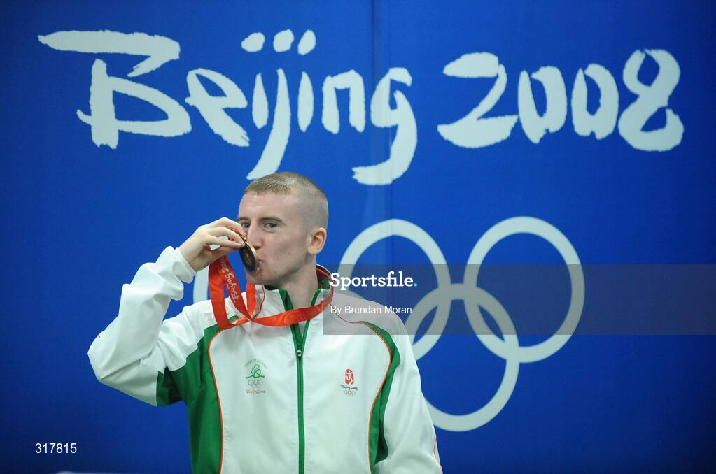 24 August 2008; Ireland's Paddy Barnes kisses his bronze medal that he won in the Light Fly weight, 48kg, category. Beijing 2008 - Games of the XXIX Olympiad, Beijing Workers' Gymnasium, Olympic Green, Beijing, China. Picture credit: Brendan Moran / SPORTSFILE
