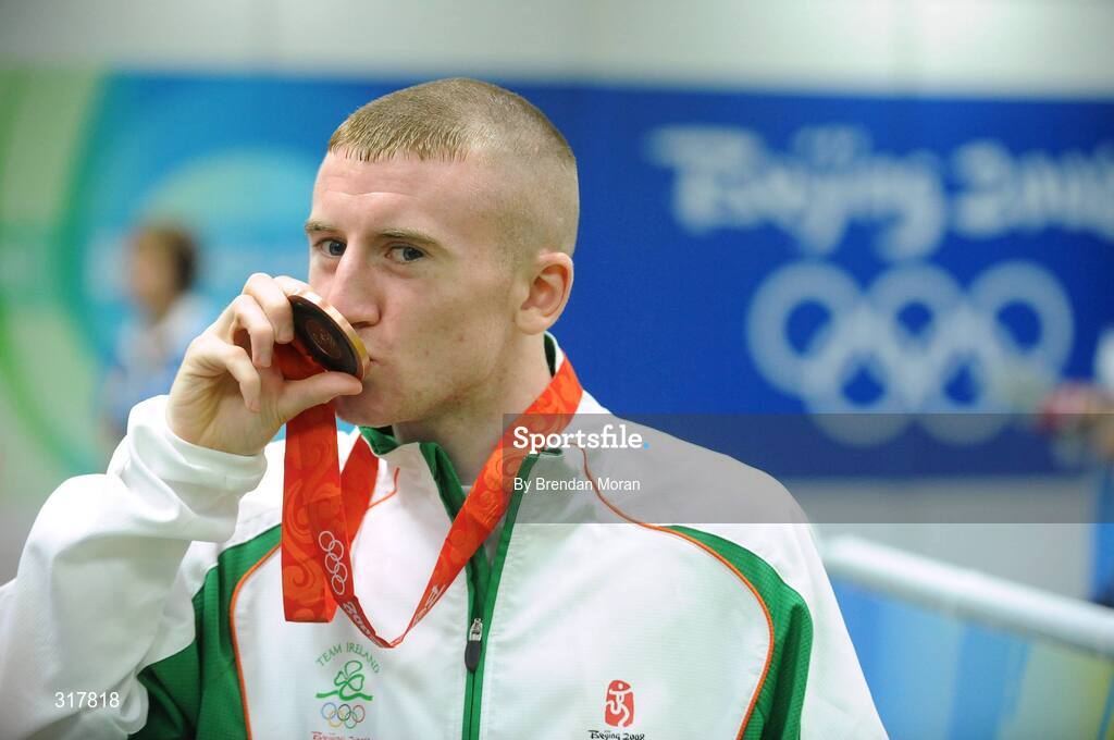 24 August 2008; Ireland's Paddy Barnes kisses his bronze medal that he won in the Light Fly weight, 48kg, category. Beijing 2008 - Games of the XXIX Olympiad, Beijing Workers' Gymnasium, Olympic Green, Beijing, China. Picture credit: Brendan Moran / SPORTSFILE