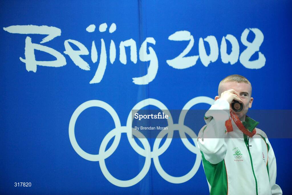 24 August 2008; Ireland's Paddy Barnes kisses his bronze medal that he won in the Light Fly weight, 48kg, category. Beijing 2008 - Games of the XXIX Olympiad, Beijing Workers' Gymnasium, Olympic Green, Beijing, China. Picture credit: Brendan Moran / SPORTSFILE