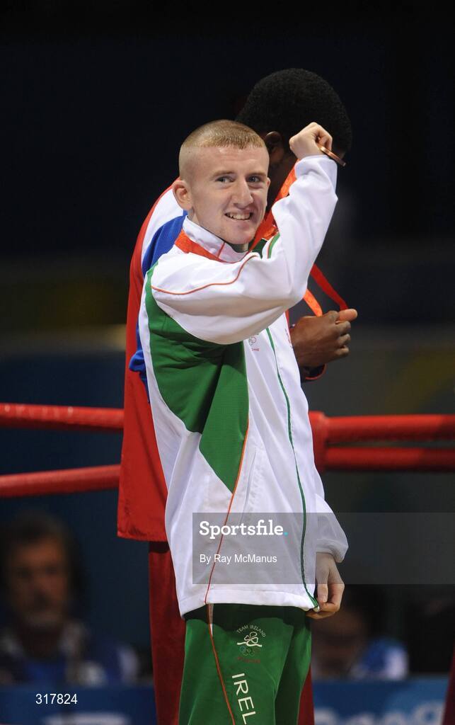 24 August 2008; Ireland's Paddy Barnes celebrates with his bronze medal after the presentation in the Light Fly weight, 48kg, category. Beijing 2008 - Games of the XXIX Olympiad, Beijing Workers' Gymnasium, Olympic Green, Beijing, China. Picture credit: Ray McManus / SPORTSFILE