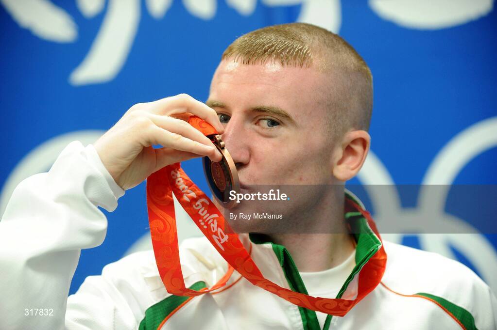 24 August 2008; Ireland's Paddy Barnes kisses his bronze medal after the presentation in the Light Fly weight, 48kg, category. Beijing 2008 - Games of the XXIX Olympiad, Beijing Workers' Gymnasium, Olympic Green, Beijing, China. Picture credit: Ray McManus / SPORTSFILE