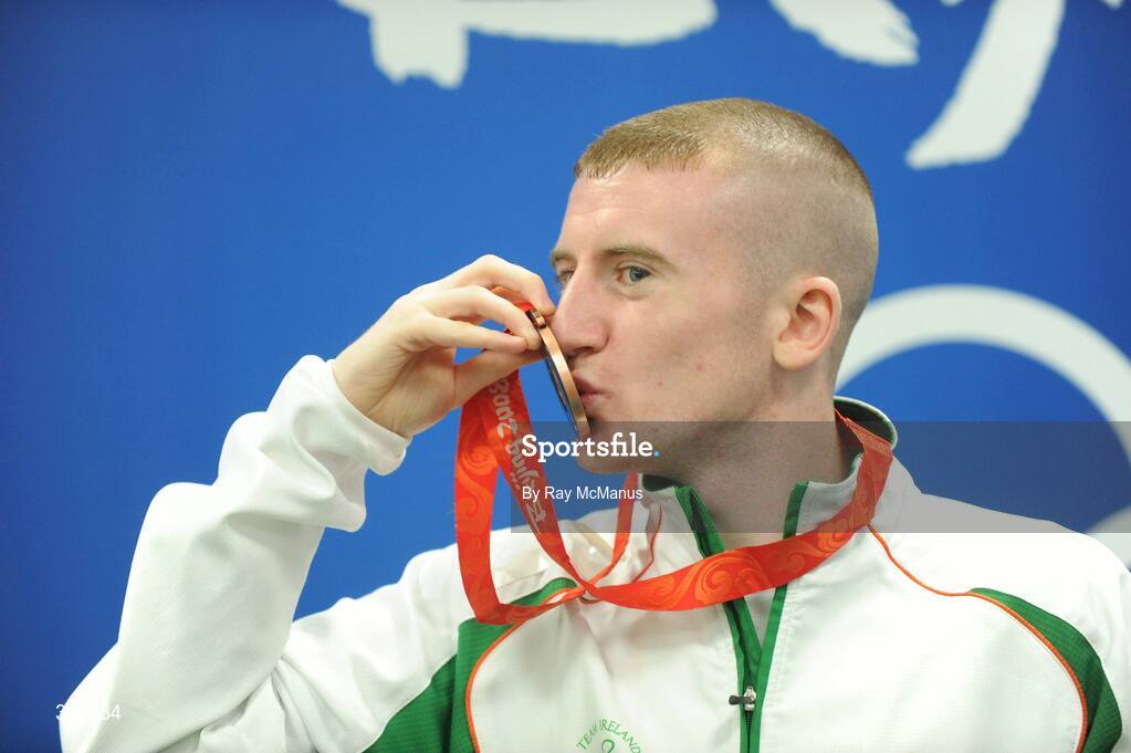 24 August 2008; Ireland's Paddy Barnes kisses his bronze medal after the presentation in the Light Fly weight, 48kg, category. Beijing 2008 - Games of the XXIX Olympiad, Beijing Workers' Gymnasium, Olympic Green, Beijing, China. Picture credit: Ray McManus / SPORTSFILE