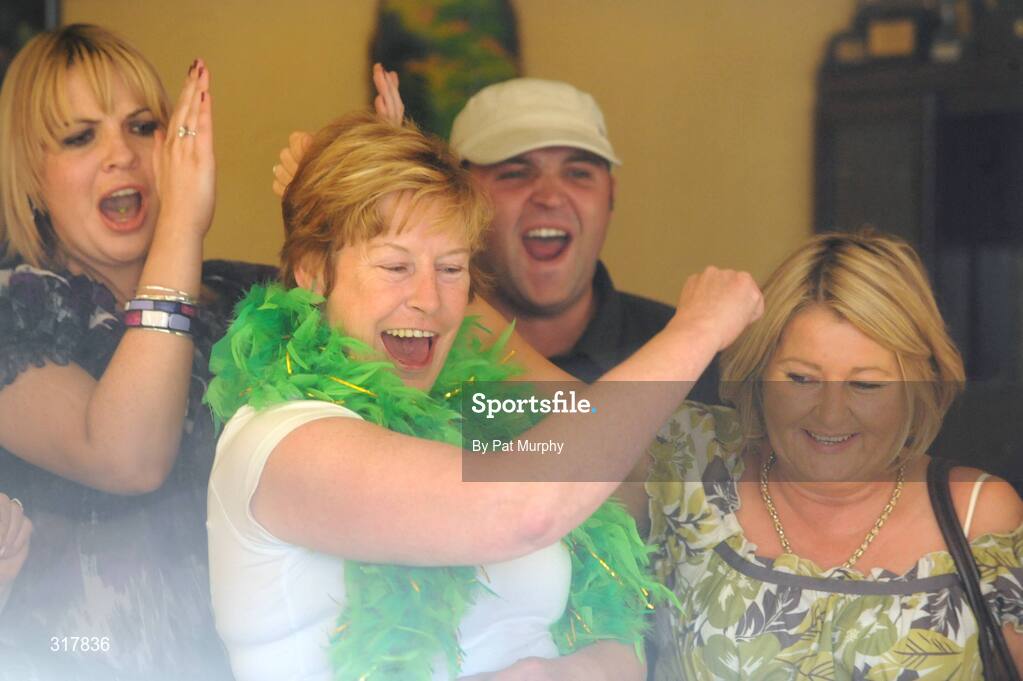 24 August 2008; Maura Egan, mother of Irish boxer Kenny Egan, celebrates in the family home in Clondalkin, Dublin, as her son was presented with his silver medal after his final bout in the light heavyweight, 71kg, contest at the Beijing 2008 Olympics Games, China. Picture credit: Pat Murphy / SPORTSFILE