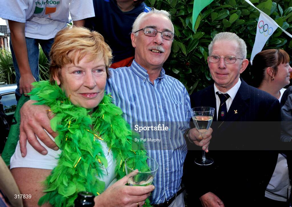 24 August 2008; Maura and Paul Egan, parents of Irish Boxer Kenny Egan, outside the family home in Clondalkin, Dublin, with Austin Carruth, father of 1992 Olympic Gold medalist Michael Carruth, after their son was presented with his silver medal after his final bout in the light heavyweight, 71kg, contest at the Beijing 2008 Olympics Games, China. Picture credit: Pat Murphy / SPORTSFILE