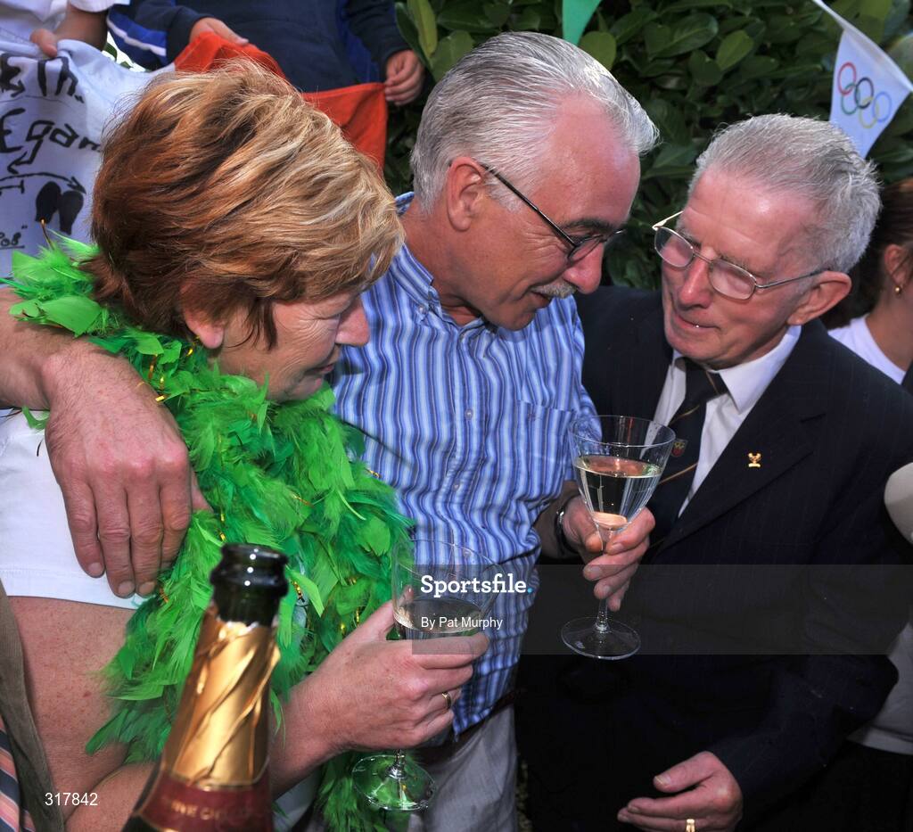 24 August 2008; Maura and Paul Egan, parents of Irish Boxer Kenny Egan, outside the family home in Clondalkin, Dublin, with Austin Carruth, father of 1992 Olympic Gold medalist Michael Carruth, after their son was presented with his silver medal after his final bout in the light heavyweight, 71kg, contest at the Beijing 2008 Olympics Games, China. Picture credit: Pat Murphy / SPORTSFILE