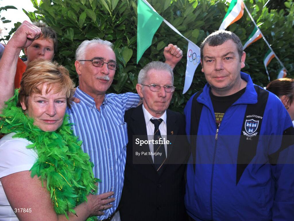 24 August 2008; Maura and Paul Egan, parents of Irish Boxer Kenny Egan, outside the family home in Clondalkin, Dublin, with Austin Carruth, father of 1992 Olympic Gold medalist Michael Carruth, and Gerard Flemming, Kenny's coach in Neilstown Boxing Club, after their son was presented with his silver medal after his final bout in the light heavyweight, 71kg, contest at the Beijing 2008 Olympics Games, China. Picture credit: Pat Murphy / SPORTSFILE