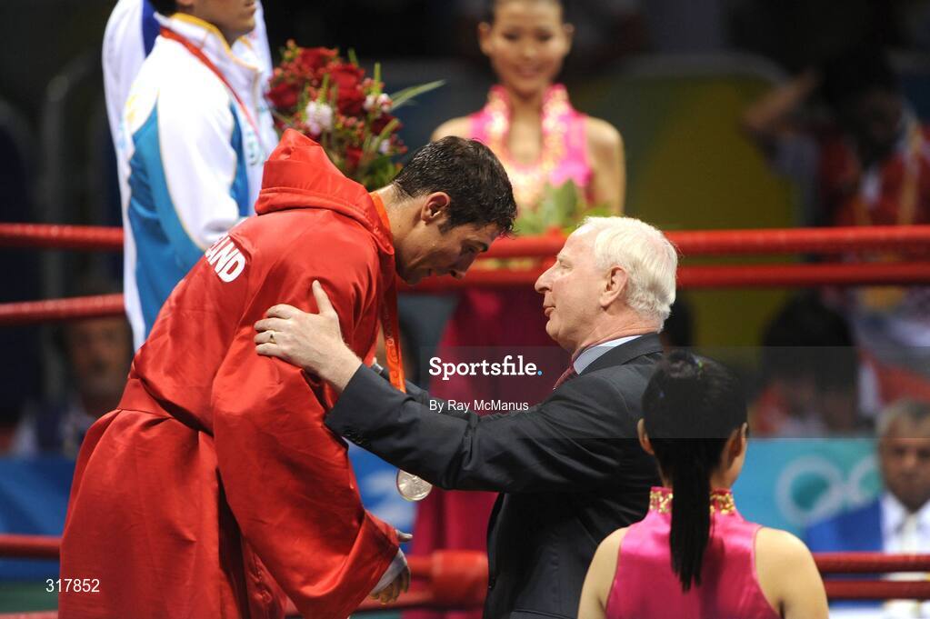 24 August 2008; Ireland's Kenneth Egan is presented with his silver medal by Patrick Hickey, president of the Olympic Council of Ireland and president of the European Olympic Committee, during the presentations in the Light Heavy weight, 81kg, category. Beijing 2008 - Games of the XXIX Olympiad, Beijing Workers' Gymnasium, Olympic Green, Beijing, China. Picture credit: Ray McManus / SPORTSFILE