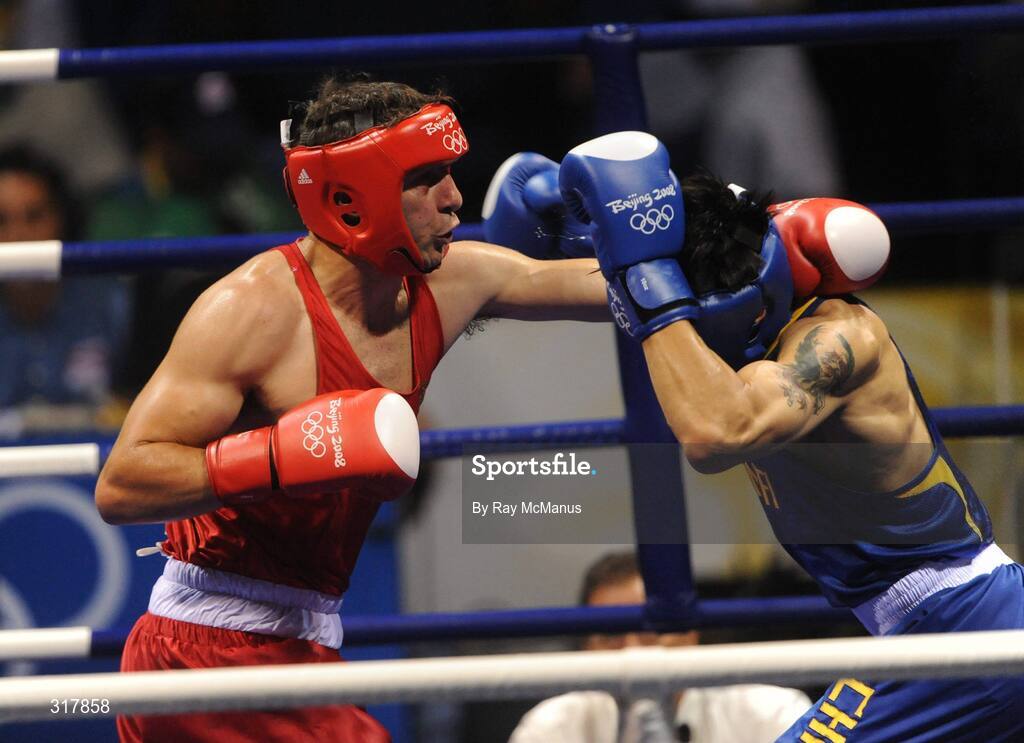 24 August 2008; Kenneth Egan, Ireland, in action during his bout with Xiaoping Zhang, in blue, China, in the Light Heavy weight Final, 81kg, contest. Beijing 2008 - Games of the XXIX Olympiad, Beijing Workers' Gymnasium, Olympic Green, Beijing, China. Picture credit: Ray McManus / SPORTSFILE