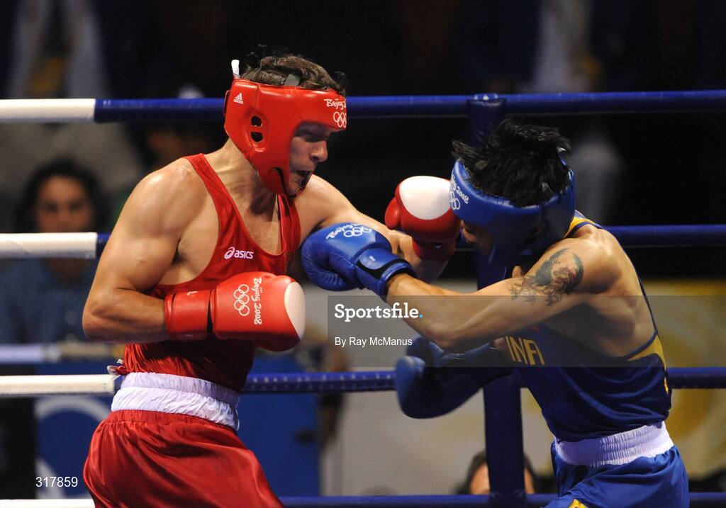 24 August 2008; Kenneth Egan, Ireland, in action during his bout with Xiaoping Zhang, in blue, China, in the Light Heavy weight Final, 81kg, contest. Beijing 2008 - Games of the XXIX Olympiad, Beijing Workers' Gymnasium, Olympic Green, Beijing, China. Picture credit: Ray McManus / SPORTSFILE