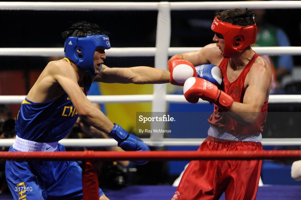 24 August 2008; Kenneth Egan, Ireland, in action during his bout with Xiaoping Zhang, in blue, China, in the Light Heavy weight Final, 81kg, contest. Beijing 2008 - Games of the XXIX Olympiad, Beijing Workers' Gymnasium, Olympic Green, Beijing, China. Picture credit: Ray McManus / SPORTSFILE