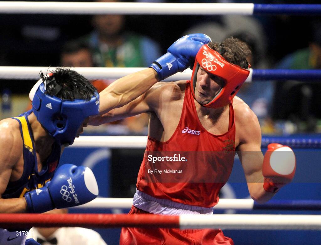 24 August 2008; Kenneth Egan, Ireland, in action during his bout with Xiaoping Zhang, in blue, China, in the Light Heavy weight Final, 81kg, contest. Beijing 2008 - Games of the XXIX Olympiad, Beijing Workers' Gymnasium, Olympic Green, Beijing, China. Picture credit: Ray McManus / SPORTSFILE