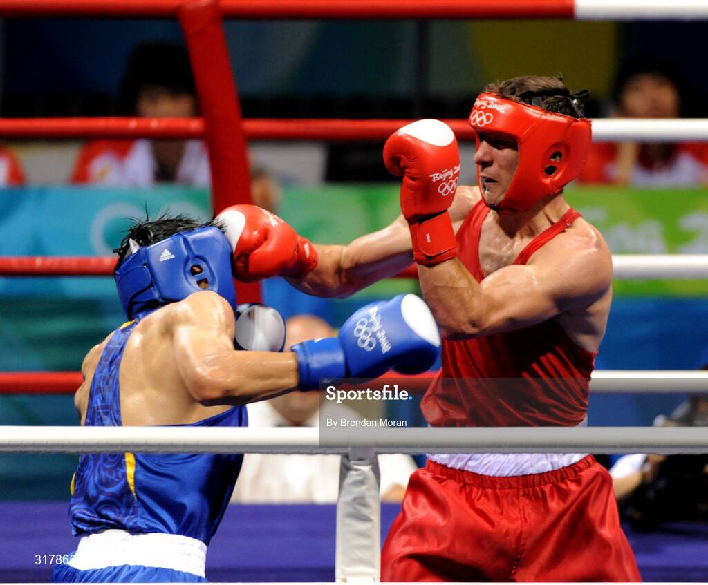 24 August 2008; Kenneth Egan, Ireland, in action during his bout with Xiaoping Zhang, in blue, China, in the Light Heavy weight Final, 81kg, contest. Beijing 2008 - Games of the XXIX Olympiad, Beijing Workers' Gymnasium, Olympic Green, Beijing, China. Picture credit: Brendan Moran / SPORTSFILE