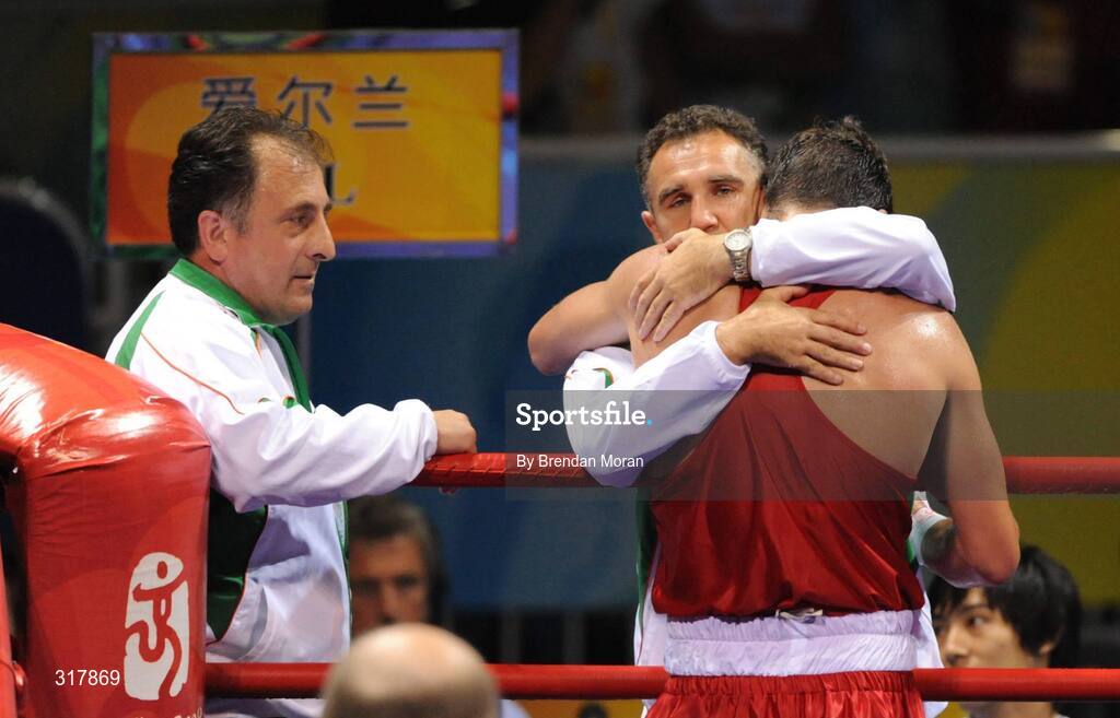 24 August 2008; Kenneth Egan, Ireland, is consoled by head coach Billy Walsh after being defeated by Xiaoping Zhang, China, in the Light Heavy weight Final, 81kg, contest. Beijing 2008 - Games of the XXIX Olympiad, Beijing Workers' Gymnasium, Olympic Green, Beijing, China. Picture credit: Brendan Moran / SPORTSFILE