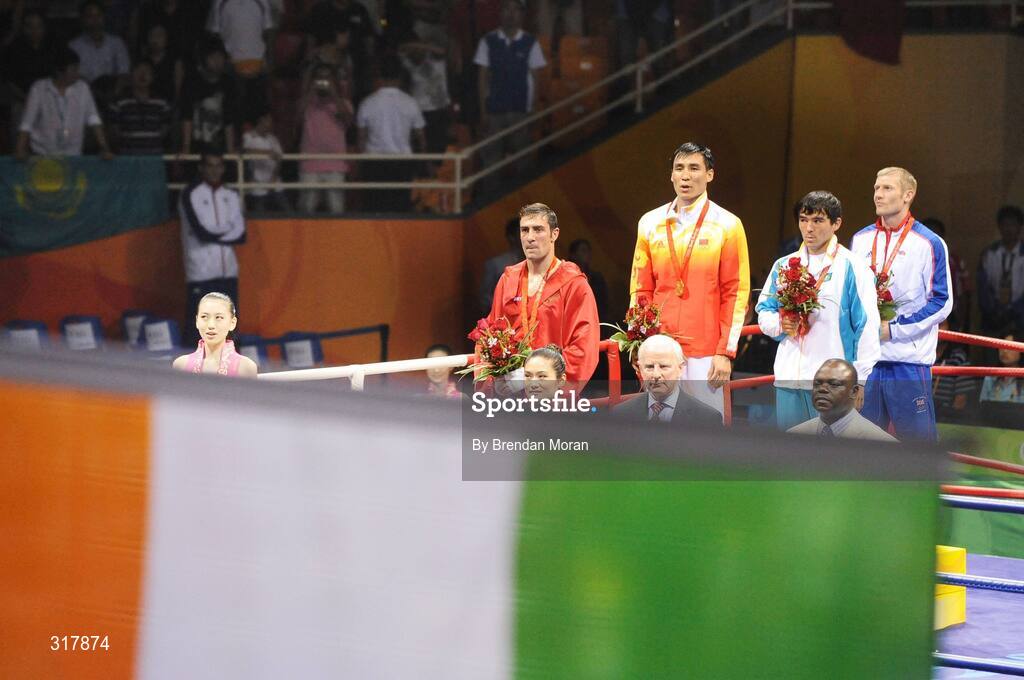 24 August 2008; Medallists, from left, Kenneth Egan, Ireland, Xiaoping Zhang, China, Yerkebulan Shynaliyev, Kazahkstan and Tony Jeffries, Great Britain, during the medal presentation in the Light Heavy weight, 81kg, category. Also pictured is Pat Hickey, President of the Olympic Council of Ireland, front, second from right, who presented the medals. Beijing 2008 - Games of the XXIX Olympiad, Beijing Workers' Gymnasium, Olympic Green, Beijing, China. Picture credit: Brendan Moran / SPORTSFILE