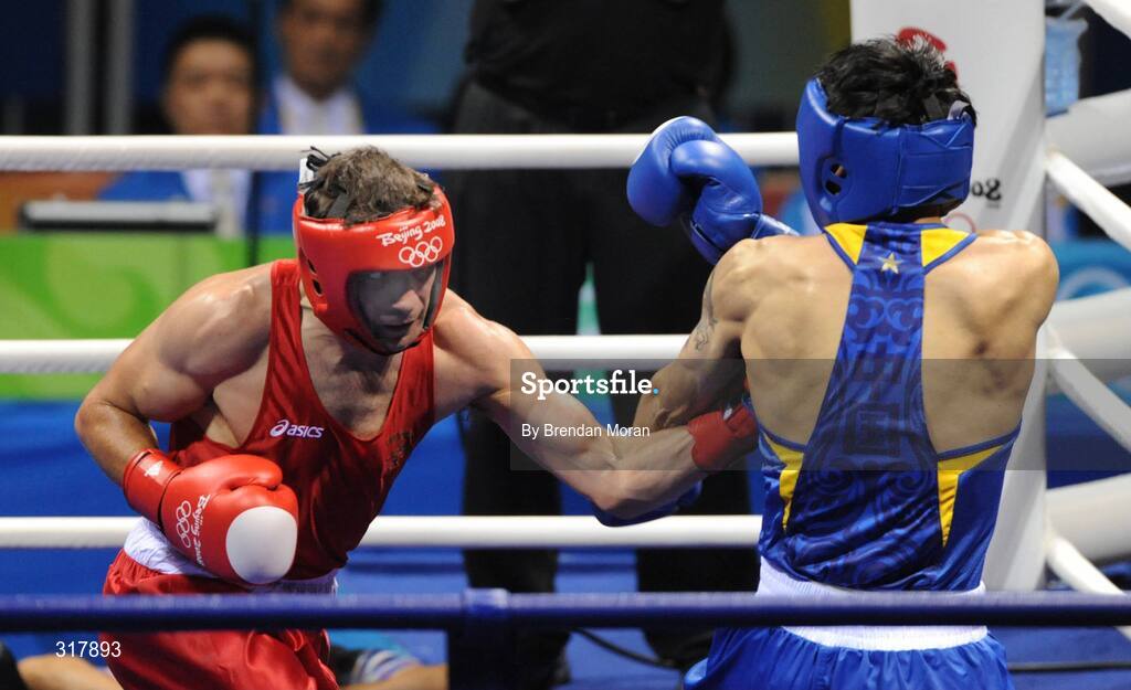 24 August 2008; Kenneth Egan, Ireland, in action during his bout with Xiaoping Zhang, in blue, China, in the Light Heavy weight Final, 81kg, contest. Beijing 2008 - Games of the XXIX Olympiad, Beijing Workers' Gymnasium, Olympic Green, Beijing, China. Picture credit: Brendan Moran / SPORTSFILE