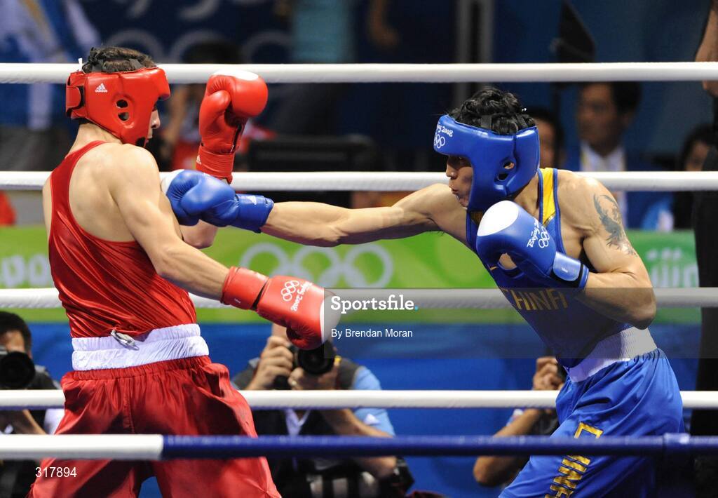 24 August 2008; Kenneth Egan, Ireland, in action during his bout with Xiaoping Zhang, in blue, China, in the Light Heavy weight Final, 81kg, contest. Beijing 2008 - Games of the XXIX Olympiad, Beijing Workers' Gymnasium, Olympic Green, Beijing, China. Picture credit: Brendan Moran / SPORTSFILE