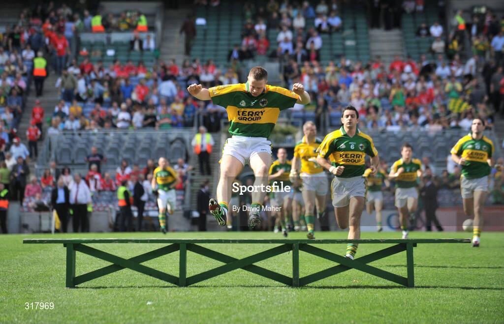 24 August 2008; Kerry captain Tomas O'Se jumps over the team bench before the team photograph. GAA Football All-Ireland Senior Championship Semi-Final, Kerry v Cork, Croke Park, Dublin. Picture credit: David Maher / SPORTSFILE