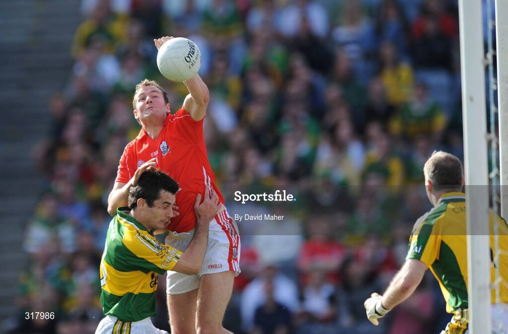 24 August 2008; James Masters, Cork, beats Tom O'Sullivan, Kerry, to score his side's second goal during the closing stages of the game. GAA Football All-Ireland Senior Championship Semi-Final, Kerry v Cork, Croke Park, Dublin. Picture credit: David Maher / SPORTSFILE