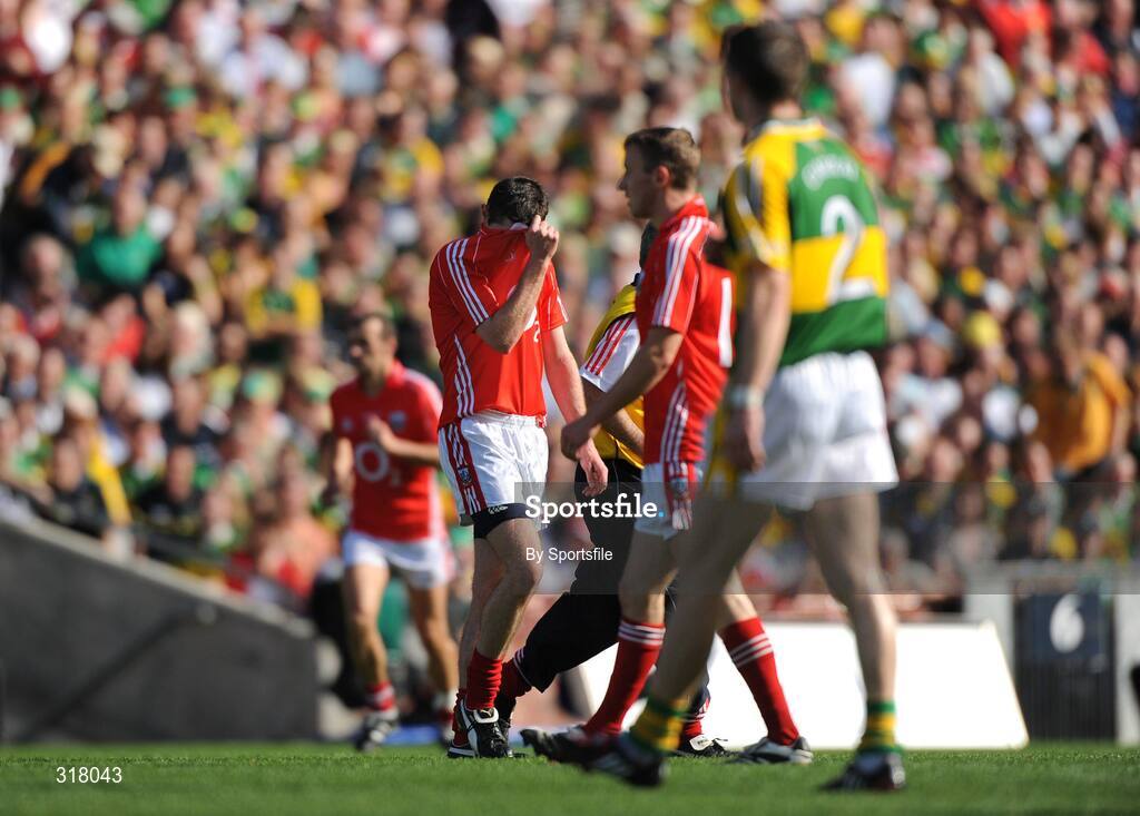 24 August 2008; Donncha O'Connor, Cork, walks off the pitch after being shown the red card by referee Joe McQuillian. GAA Football All-Ireland Senior Championship Semi-Final, Kerry v Cork, Croke Park, Dublin. Photo by Sportsfile