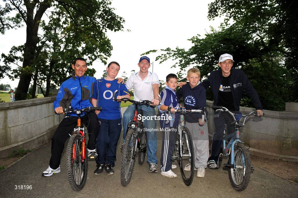 26 August 2008; Riders, from left, Marco Pinotti, Team Columbia, David O'Loughlin, Pezula, Irish National Champion Dan Martin, Garmin Chipotle H30, with local children, from left, Stephen Murphy, age 12, Cian Markey, age 12, and Niall Norman, age 12, at a photocall ahead of tomorrow's start of the Tour of Ireland. Tour of Ireland Press Conference, Crowne Plaza Hotel, Dublin. Picture credit: Stephen McCarthy / SPORTSFILE