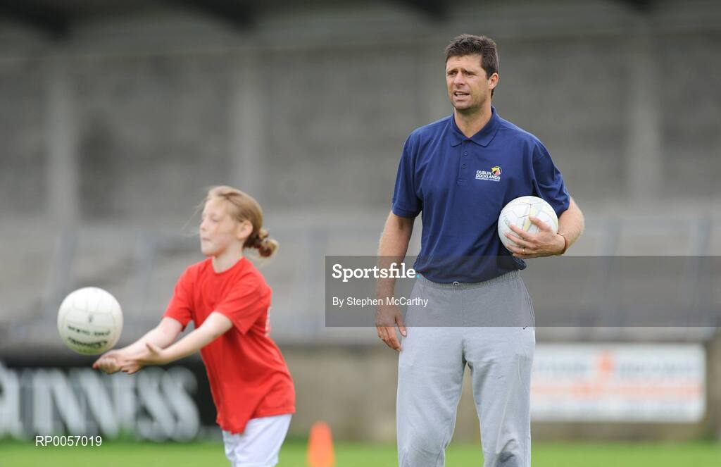 26 August 2008; Now in its sixth year, the Dublin Docklands Festival of Hurling and Gaelic Football helps young people from the Docklands develop their hurling and football skills. Today they had the experience of learning hurling and football skills from their sporting heroes Niall Quinn, Nicky English and Paul Casey during this year’s Docklands Festival of Hurling and Gaelic Football at Parnell Park. Picture credit: Stephen McCarthy / SPORTSFILE