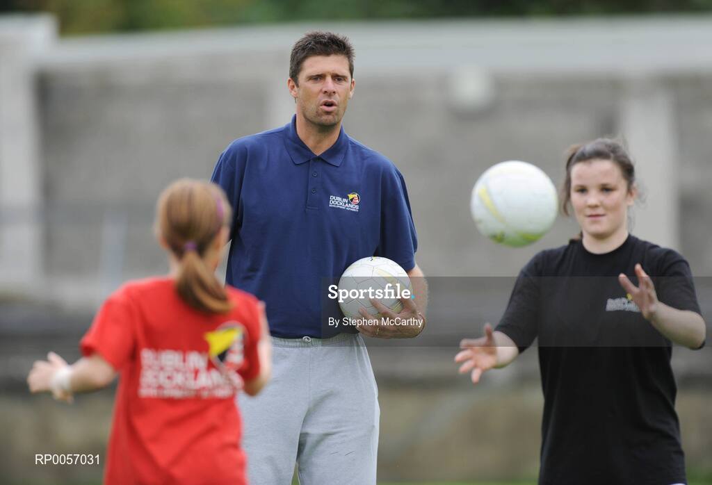 26 August 2008; Now in its sixth year, the Dublin Docklands Festival of Hurling and Gaelic Football helps young people from the Docklands develop their hurling and football skills. Today they had the experience of learning hurling and football skills from their sporting heroes Niall Quinn, Nicky English and Paul Casey during this year’s Docklands Festival of Hurling and Gaelic Football at Parnell Park. Pictured taking part under the guidance of Niall Quinn is Paige McGovern, age 9, left, and Chelsea Spain, age 15. Parnell Park, Dublin. Picture credit: Stephen McCarthy / SPORTSFILE